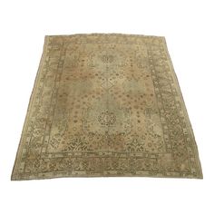 an antique rug is shown on a white background