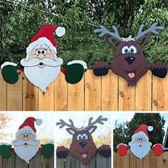 christmas yard decorations with santa claus and reindeer heads on the side of a wooden fence