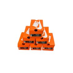 six orange nike shoes stacked on top of each other in front of a white background