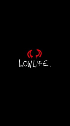 the words low life written in red on a black background