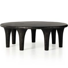 a black table with three legs and a circular top on it's side, against a white background