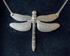 Handmade silver large dragonfly charm necklace with silver plated chain. Size of dragonfly is 63 x 72mm and is Tibetan silver.  I also have other listings with dragonflies.  Necklace can be made to whatever length preferred. Matching Earrings also available  All items come wrapped in tissue and in gift bag. Thank you Dragonfly Jewelry, Dragonfly Charm, Starfish Necklace, Small Gift Bags, Delicate Earrings, Hammered Silver, Charm Earrings, Matching Earrings, Handmade Silver