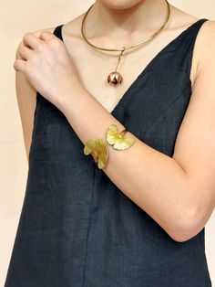 Here is a dainty Ginkgo brass bracelet with a art nouveau taste turned in a boho chic jewel. These rings and bracelet are gold-colored, but simple trinkets are still a hinkcker. The brass is bendable, please bend the product along your finger to adjust the ring, bracelet to be fit to your hand! ►Handcrafted from 100% pure brass by Vietnam skilled craftsman. It is soldered together using hand-engraved, hammered, textured and gently polished. Due to the simplicity, these earrings are perfect for i Wearable Art Gold Jewelry Made Of Copper, Gold Wearable Art Jewelry, Butterfly Bracelet Gold, Gold Arm Band, Bracelet Butterfly, Leaf Bracelet, Butterfly Bracelet, Brass Bracelet, Dainty Bracelets