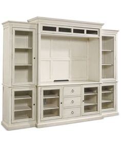 a white entertainment center with glass doors and drawers