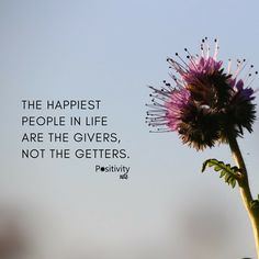 a purple flower with a quote on it that says the happiest people in life are the givers, not the getters