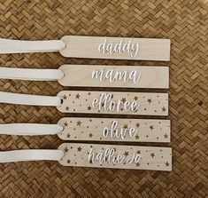 four wooden spoons with the words daddy, mama, before we have babies written on them