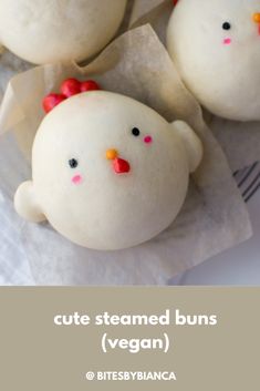 three stuffed buns are sitting on top of each other with the words, cute steamed buns vegan