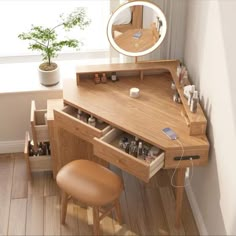 a wooden desk with drawers and a mirror on the wall next to a chair in front of it