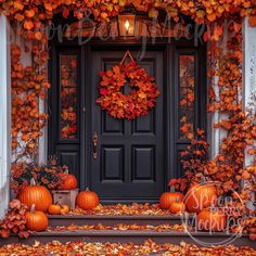 a front door decorated with pumpkins and leaves