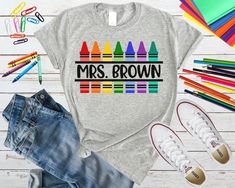 a t - shirt that says mrs brown with crayons on it