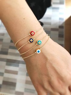 Evil eye bracelet gold, evil eye jewelry, gold chain bracelet, evil eye charm, blue evil eye bead, greek bracelet, greek jewelry, turkish evil eye, protection bracelet 🌟 There are 4 colors available- please choose during checkout; - Dark Blue - Red - Green - White 🌟Beads size: 9mm Lenght of chain: Gold Evil Eye Jewelry, Greek Bracelet, Evil Eye Bracelet Gold, Diamond Carat Size, Shiny Bracelets, Pink Wedding Rings, Pink Gold Rings, Diamond Bracelet Design, Gold Chain Bracelet