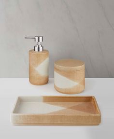 a bathroom set with soap dispenser, soap dish and sponge holder