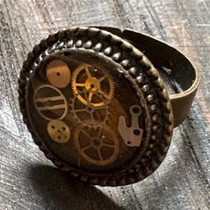 Step into a world of imagination with our unique steampunk ring, a one-of-a-kind piece that fuses vintage aesthetics with modern creativity. Crafted with intricate details, gears, and artistic flair, this ring is perfect for those who appreciate distinctive jewelry. Ideal for everyday wear or as a memorable gift, it's a striking addition to any collection Steampunk Ring, Steampunk Rings, World Of Imagination, Vintage Aesthetics, Christmas Deals, Objet D'art, Memorable Gifts, Art Object, Intricate Details