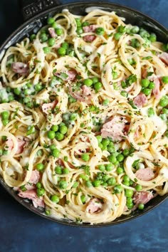 pasta with shrimp and broccoli in a skillet