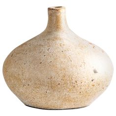 a white vase with brown speckles on the top and bottom, sitting in front of a white background