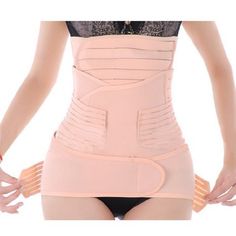 a woman wearing a pink corset with her hands on her hips and the back of her body