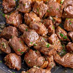 the meat is cooked and ready to be eaten in the skillet with parsley sprinkled on top