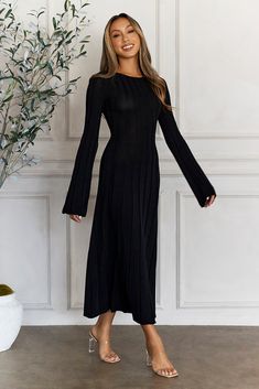 Length from shoulder to hem of size S: 110cm. 
 Chest 36cm, Waist 32cm, size S. 
 Midi dress.  
 Model is a standard XS and is wearing size XS.  
 True to size.  
 Stretch. 
 Flowy skirt. 
 Flared sleeves. 
 Ribbed. 
 Cold hand wash only.  
 Polyester. 
 
 
 
 
 
 
 
 
 
 
 
 
 Please note: This style is exclusive 
 
 
 
 
 
 
 
 
 
 
 
   
 
 
 Channel your inner style with Creating Icons Ribbed Long Sleeve Midi Dress. Featuring a gorgeous flowy skirt and flared sleeves. Style with heels to get Midi Dress Classy, Black Long Sleeve Midi Dress, Create Icon, Dress Date Night, Sleeves Style, Long Bodycon Dress, Midi Dress Black, Black Long Sleeve Dress, Long Black Dress