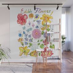 a wall mural with flowers on it and the words edible flowers written in large letters