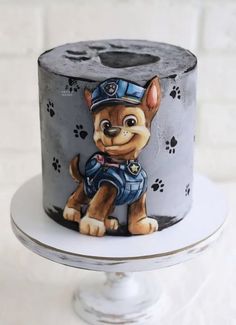 a birthday cake with a dog on it