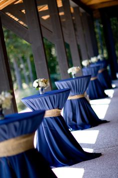 the tables are covered with blue cloths