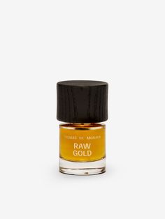 Raw Gold by Thomas de Monaco is a rich and luxurious fragrance. It opens with orris root, davana, and cedar, offering a sophisticated and woody introduction. The heart reveals a blend of suede, patchouli, and guaiac wood, creating a warm and textured middle. The base combines vanilla, oud, and benzoin for a deep, resinous finish. Ideal for those who appreciate a bold, opulent scent with a complex and layered profile. Raw Gold, Orris Root, Mirror With Lights, Light Accessories, Home Fragrance, Monaco, Vanilla, Makeup