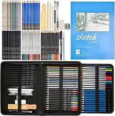 an assortment of colored pencils and markers in a black case next to a book