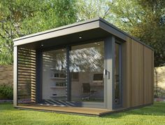 a small garden office with sliding glass doors