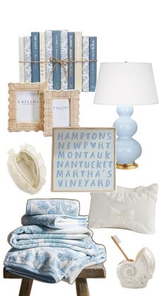 a blue and white bedroom is shown with books, pillows, lamps, and other items