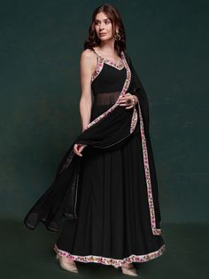 Make a bold and elegant statement with our black georgette party wear long suit with designer lace work. This sophisticated ensemble is crafted to bring out the best in your festive and party looks, combining the timeless elegance of black with exquisite design elements. Perfect for festivals, functions, and special events, this suit ensures you stand out with grace and style.
The luxurious black georgette fabric gives the suit a rich and elegant feel, while the detailed designer lace work adds Black Semi-stitched Palazzo Set With Mirror Work, Black Bollywood Style Palazzo Set For Party, Black Bollywood Palazzo Set For Party, Black Palazzo Set With Zari Work For Diwali, Diwali Black Palazzo Set With Zari Work, Festive Black Palazzo Set With Zari Work, Bollywood Style Black Palazzo Set For Festive Occasions, Bollywood Style Black Palazzo Set For Festive Season, Party Semi-stitched Black Sharara