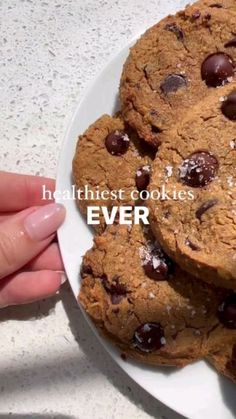 there is a white plate with cookies on it and the words healthiest cookies ever