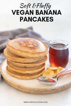 a plate with pancakes and syrup on it