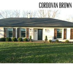 a house with the words cordovan brown on it's front door and windows