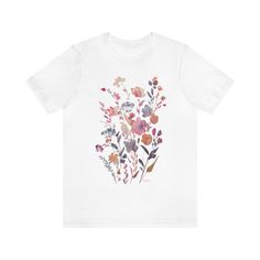 This t-shirt is printed with one of my beautiful watercolor paintings. The shirt is soft and has a great fit. It comes in white or black and in a number of sizes. It is unisex sizing, please refer to size chart when ordering.  This classic unisex jersey short sleeve tee fits like a well-loved favorite. Soft cotton and quality print make users fall in love with it over and over again. These t-shirts have-ribbed knit collars to bolster shaping. The shoulders have taping for better fit over time. D Beautiful Watercolor Paintings, Flower Watercolor, Beautiful Watercolor, Short Sleeve T Shirt, Floral Shirt, Tshirt Colors, Jersey Shorts, Print Making, Light Fabric