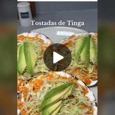 an image of food on plates with the words tostadadas de tinga