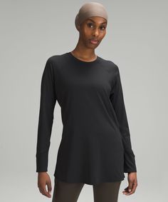 High Coverage For High Performance. This Lightweight, Crew-Neck Long Sleeve Has A Relaxed Yet Streamlined Fit And All The Technical Details You Need To Get Through A Tough Workout. Designed For Training. A Loose, Away-From-Body Fit With A Little Extra Room:slim Sleeves:long Length Keeps Bum And Hips Covered. Zippered Pocket. This Garment Was Treated With No-Stink Zinc To Inhibit The Growth Of Odour-Causing Bacteria On The Fabric. | Abrasion-Resistant High-Coverage Long-Sleeve Shirt Womens Long Sleeve Shirts, Extra Room, Body Fit, Long Length, Shirt Outfit, Shirt Online, Fabric Material, Women Long Sleeve, High Performance