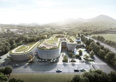 an artist's rendering of a large building surrounded by greenery and parking lots