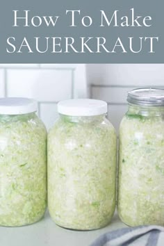 three jars filled with green stuff sitting on top of a counter