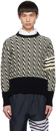 Cable knit wool- and mohair-blend sweater. Jacquard stripes throughout. · Rib knit crewneck, hem, and cuffs · Button vent at side seams and cuffs · Intarsia stripes at sleeve · Tricolor grosgrain pull-loop at back collar Supplier color: Navy Two Color Cable Knitting, Thom Browne Sweater, Mens Cable Knit Sweater, Intarsia Knitting, Knitwear Trends, Knit Men, Mens Stripes, Sweater Men, Bold Stripes