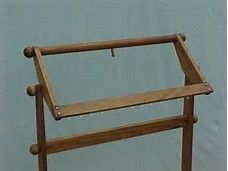 a wooden stand with two rails on each side