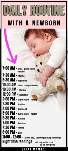 a baby sleeping next to a teddy bear on top of a white sheet with pink writing