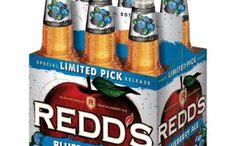 six bottles of red's blueberry apple cider