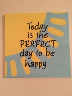 a painting that says today is the perfect day to be happy on it's wall