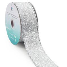 a roll of silver glitter ribbon on a white background