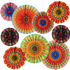 six colorful paper fans hanging from strings on a white background with multiple colors in the middle