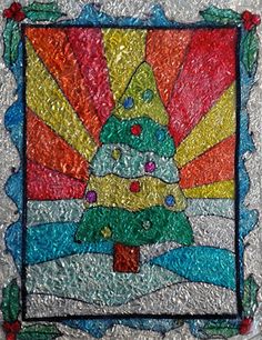 a stained glass christmas tree with the sun in the background