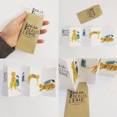 handmade cards with yellow and blue designs on them are being held by someone's hand