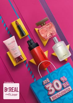 an advertisement for the brand's new perfumes is displayed on a pink and blue background