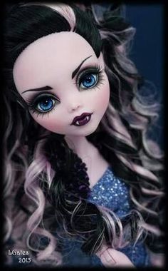 a doll with long black hair and blue eyes