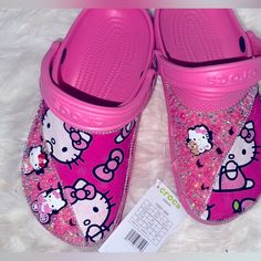 Shop sunshinehappy13's closet or find the perfect look from millions of stylists. Fast shipping and buyer protection. Turn heads with these customized hello kitty crocs Hello Kitty Curling Iron, Hello Kitty Bling Crocs, Pink Hello Kitty Crocs, Cheer Crocs, Cute Crocs Shoes, Hello Kitty Crocs, Bedazzled Crocs, Green Crocs, Crocs With Charms